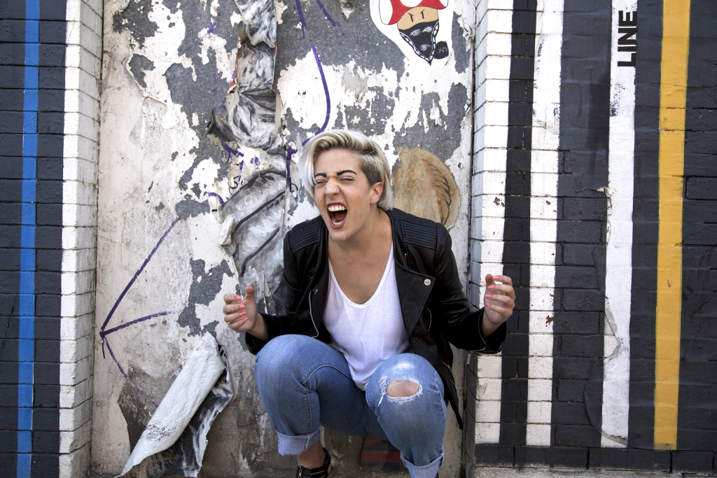 Crouching-Screaming-Yelling-Angry-Brick-Wall-Graffiti